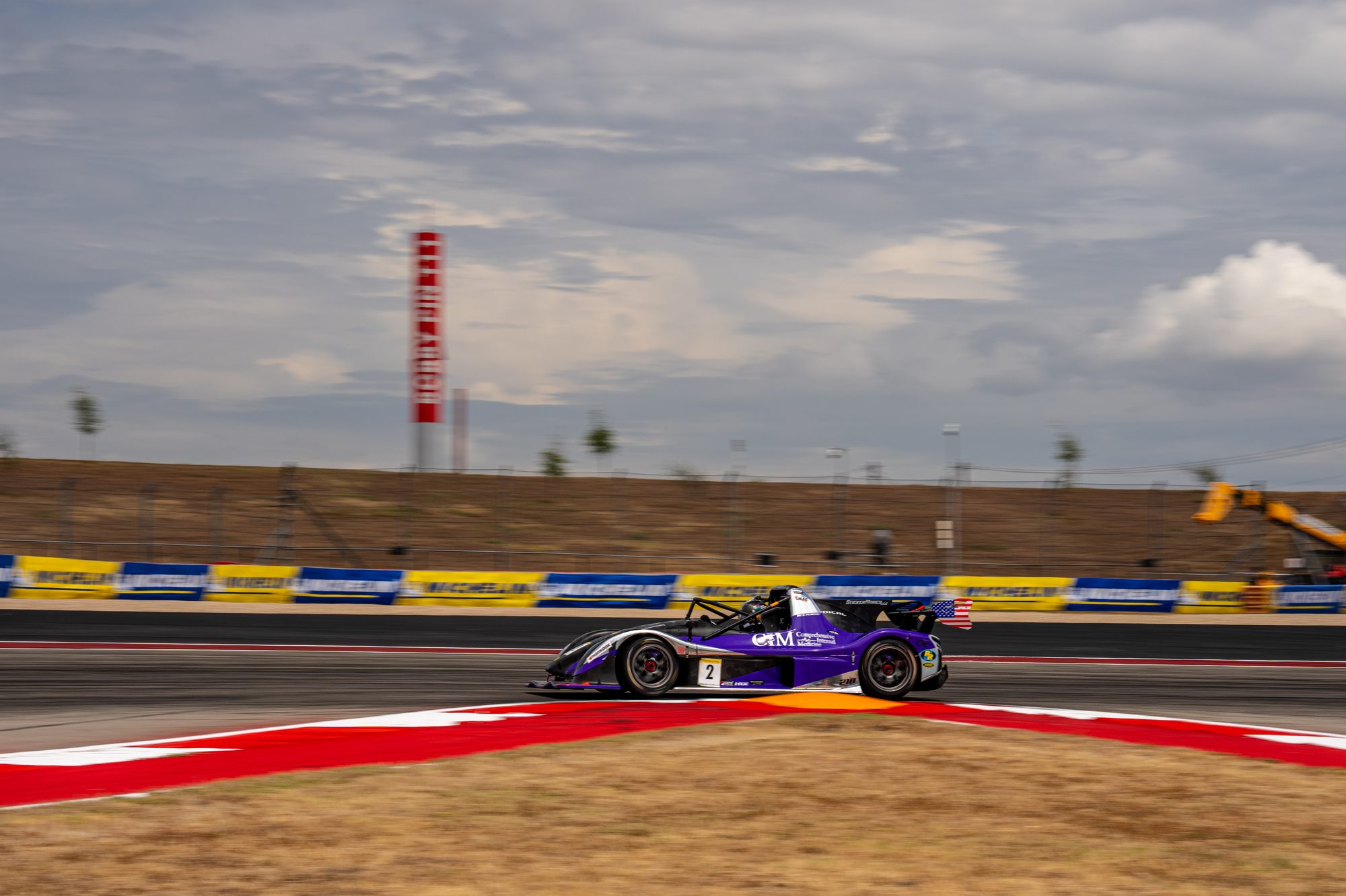 Purple Radical on the kerbs at COTA